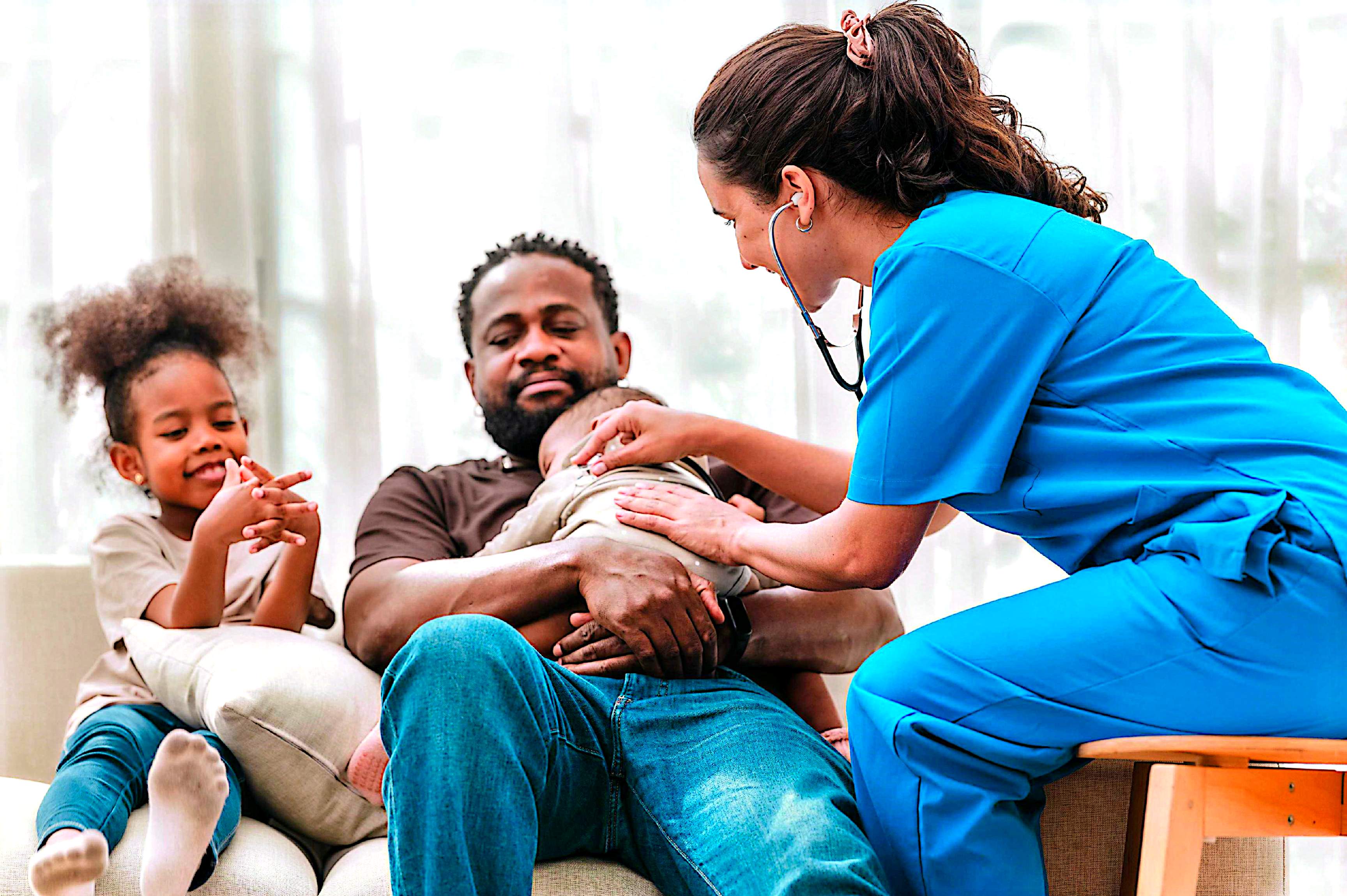 Nurse providing home care support to a family with children