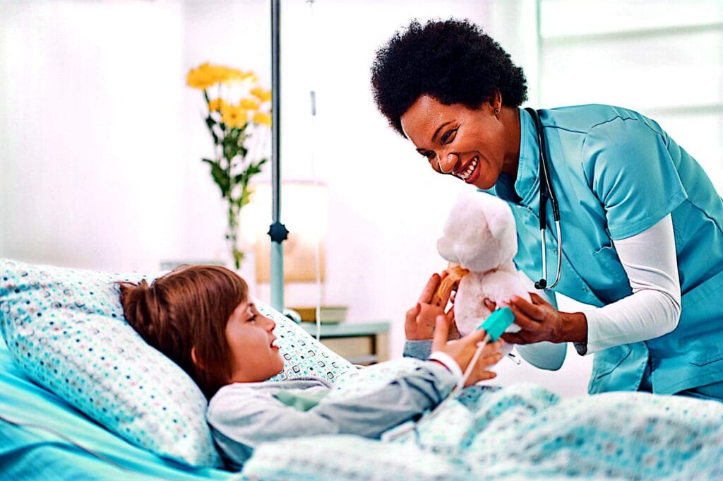 Nurse providing care to a child resting in bed at home